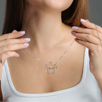 Thumbnail for Custom Turtle Name Necklace by Brother & Sisters worn by a woman, showcasing personalized turtle motif with name.