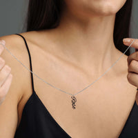 Thumbnail for Vertical Name Necklace displayed by a model, featuring the name 'Rose' in a chic vertical design by Brother & Sisters.