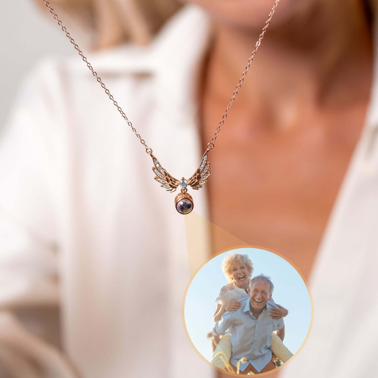 Wings Photo Necklace by Brother & Sisters, featuring a personalized photo in elegant angel wings.